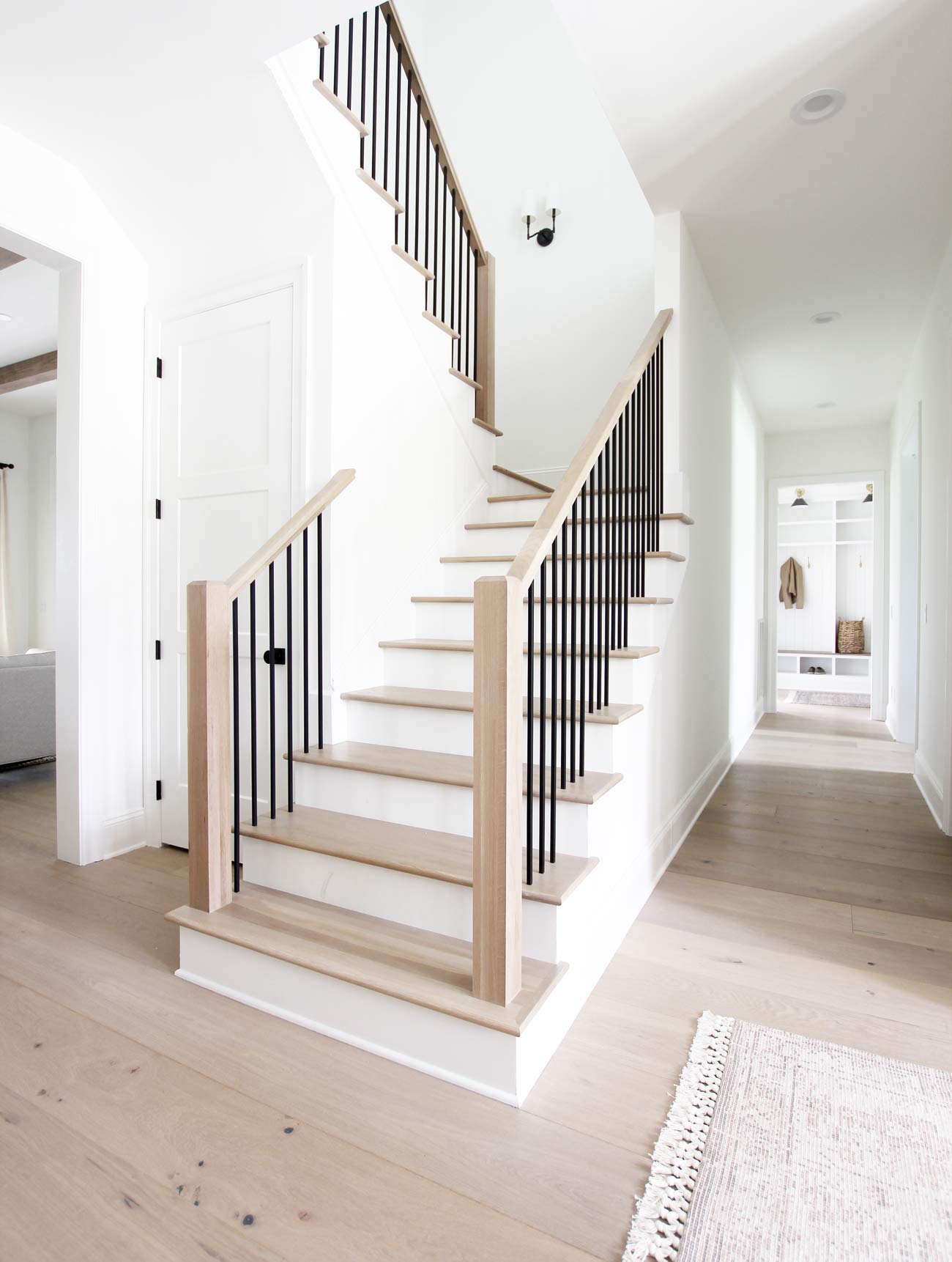 Wood staircase with contrasting white risers